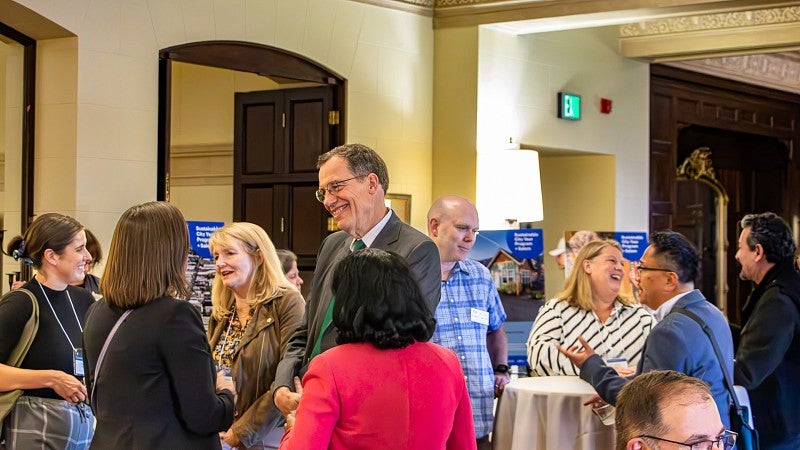 People mingle at the Salem kickoff event